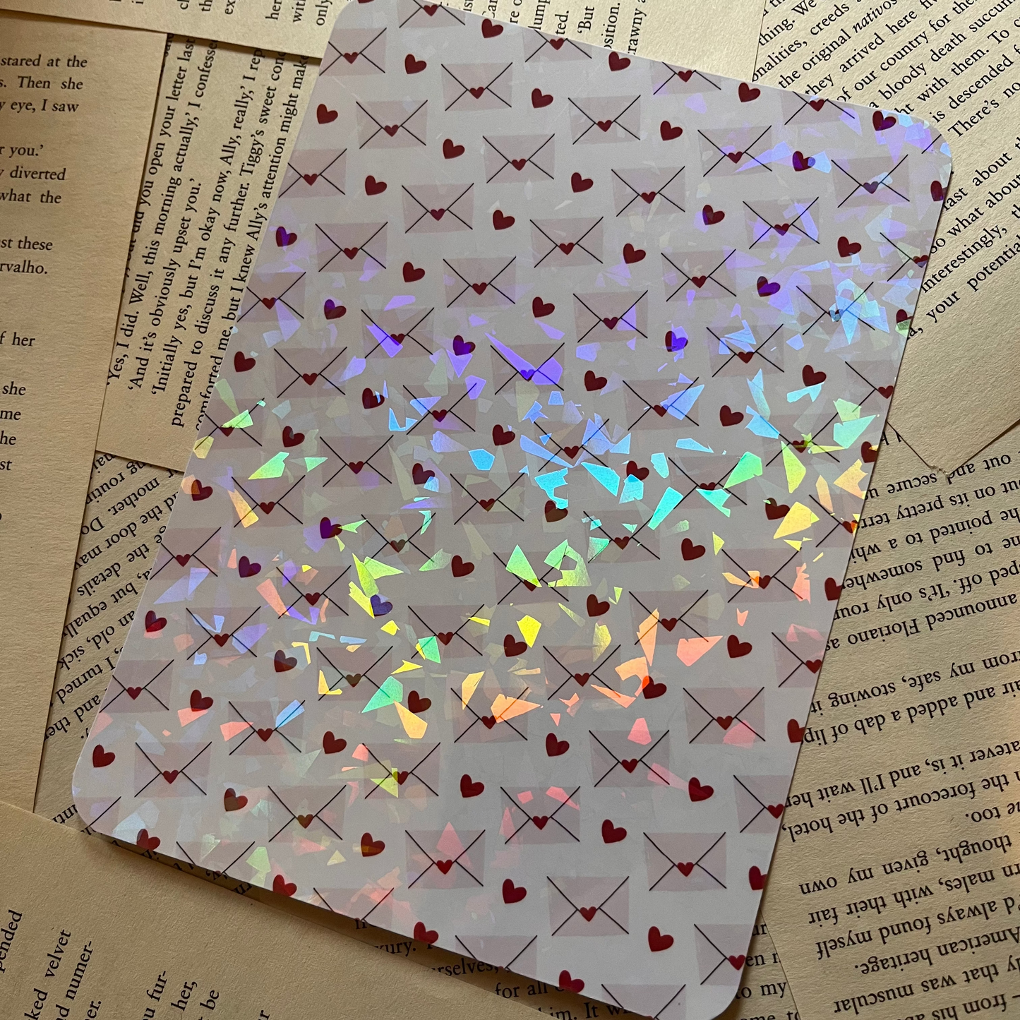 Holographic kindle insert with a love letter pattern on decorative book pages