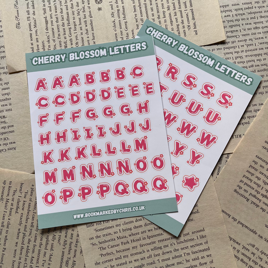 Two sheets of 'Cherry Blossom Letters' stickers on a textured paper background.