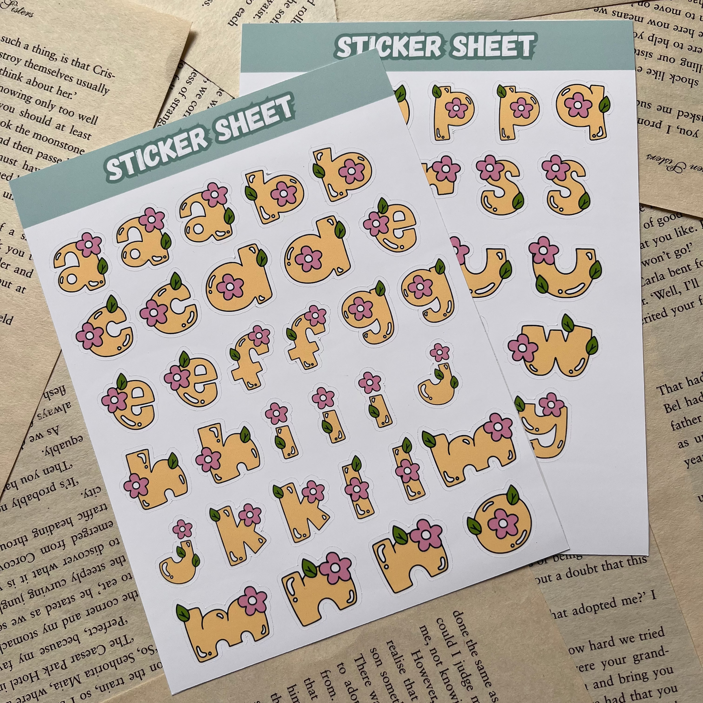 Sticker sheet with cartoon letters stickers on a textured paper background