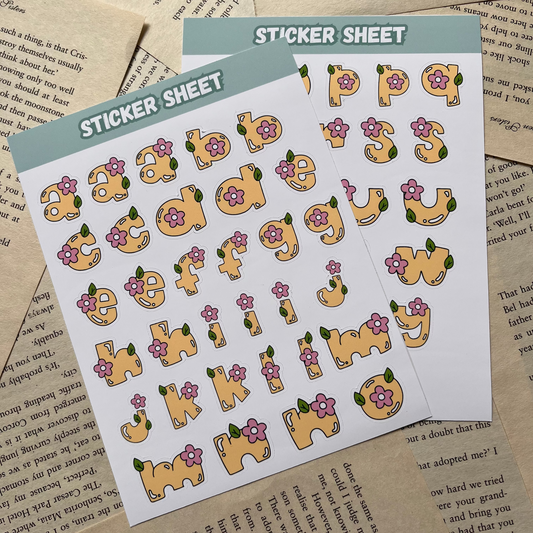 Sticker sheet with cartoon letters stickers on a textured paper background