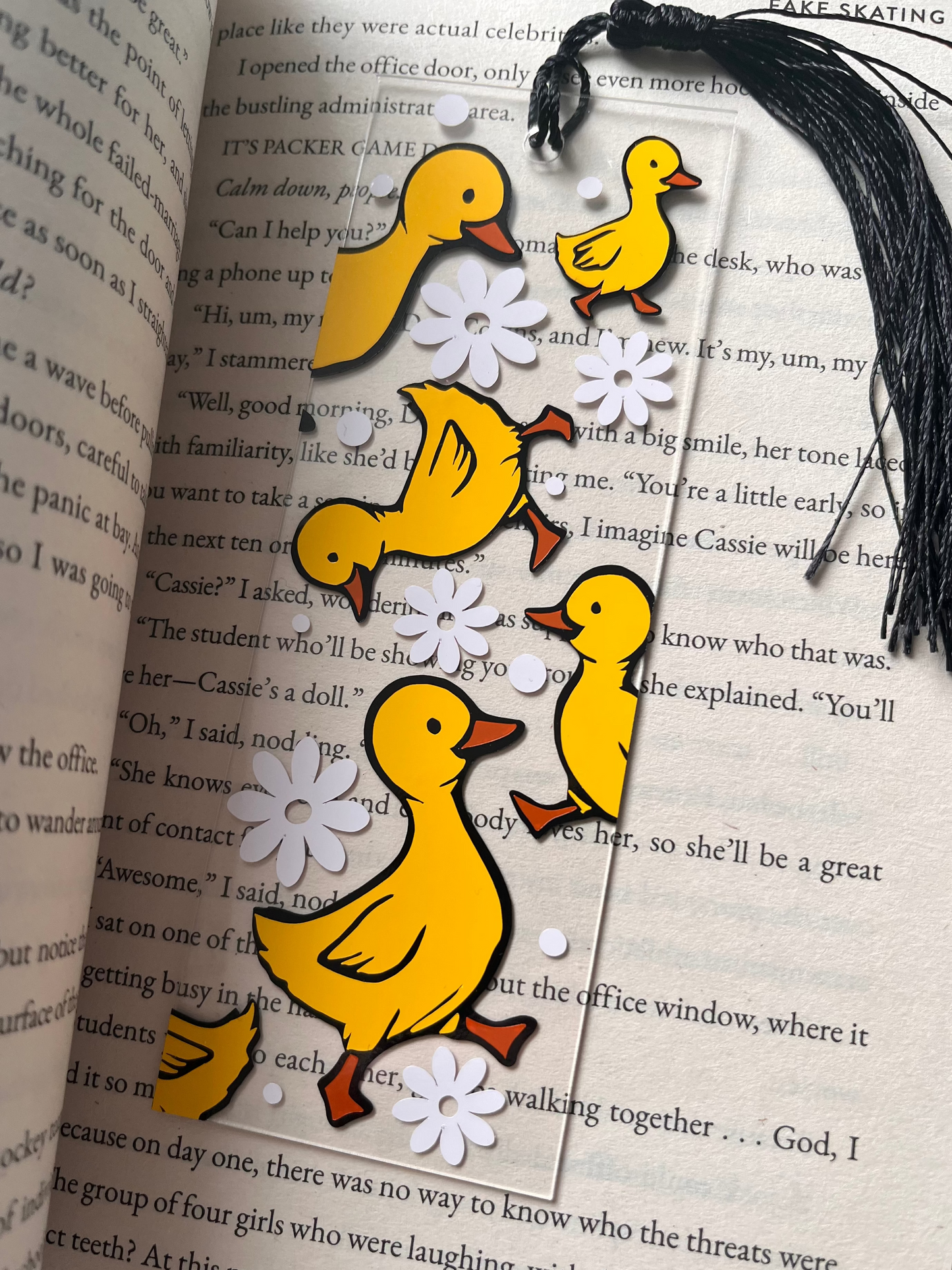 duck-themed bookmark on an open book